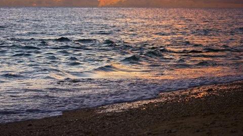 Sand And Waves On Sunset Beach. slow motion. Stock Footage 101478588