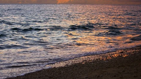 Sand And Waves On Sunset Beach. slow motion. Stock Footage 101478633