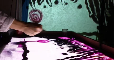 Sand animation performance with projection on the wall Stock-Footage 121620901