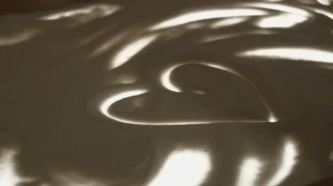 Sand animation - two hearts Video stock 62972151