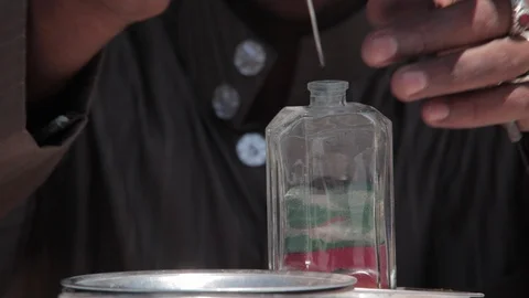 Sand art bottle in progress in Egypt Stock Footage 90890146