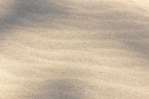 Sand background texture. Wave pattern Sandy beach backdrop Stock Photos