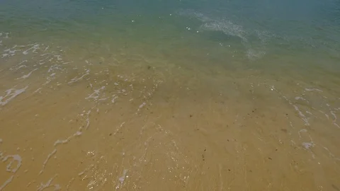 Sand beach and soft wave with blue water Stock Footage 106274142