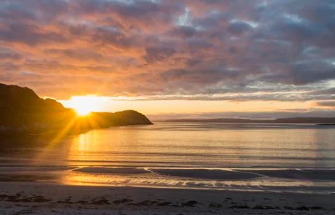 Sand beach and sunset Stock Photos