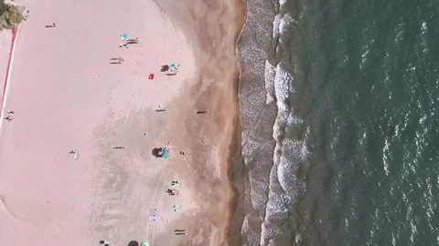 Sand beach and top view of sea waves, sunny weather Stock Footage 126188321