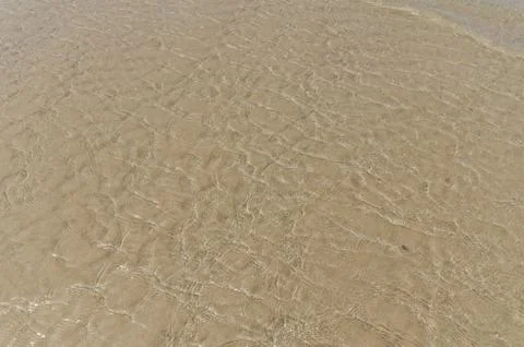 Sand beach background Stock Photos