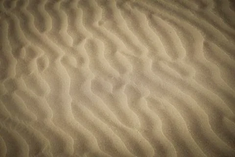 Sand on the beach Background Stock Photos
