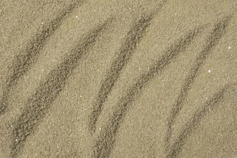 Sand on the beach as background Stock Photos
