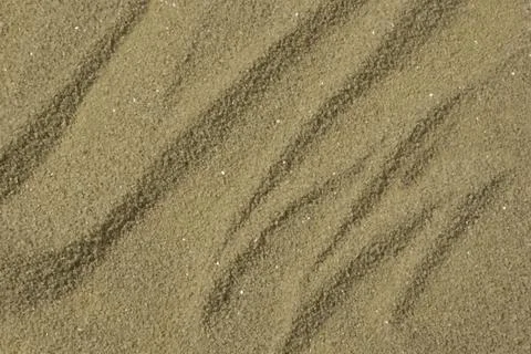 Sand on the beach as background Stock Photos