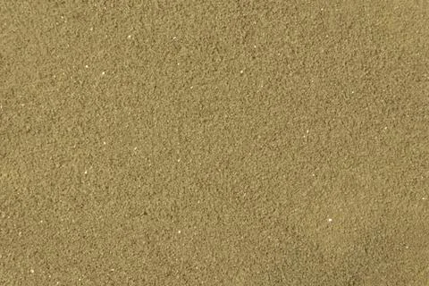 Sand on the beach as background Stock Photos