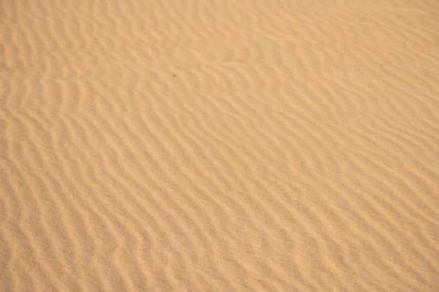 Sand of a beach with line pattern Stock Photos