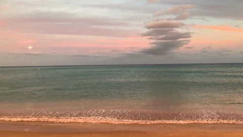 Sand Beach, Ocean at the time of Sunset Stock Footage 102677054