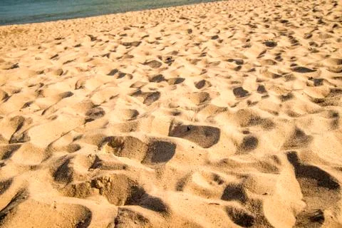 Sand of a beach with patterns Stock Photos
