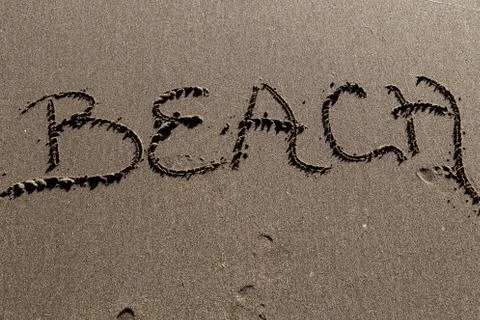 Sand beach script Stock Photos