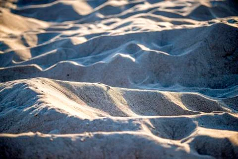 Sand of a beach with shapes Stock Photos