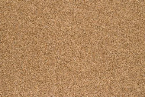 Sand on the beach in summer, texture as background Stock Photos