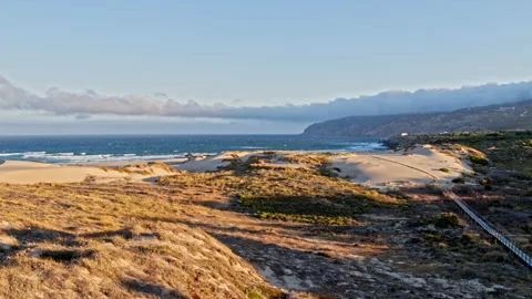 Sand beach surrounded by cliffs, Aerial Paradisiac beach holidays concept Stock Footage 220038856