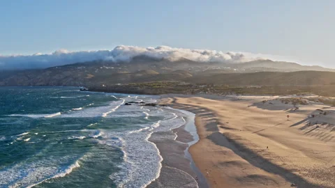 Sand beach surrounded by cliffs, Aerial Paradisiac beach holidays concept Vídeo Stock 220039433