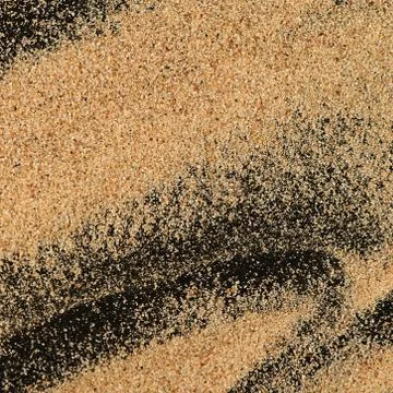 The sand on the black background Stock Photos