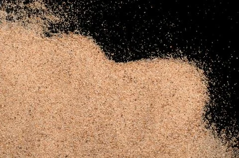 The sand on the black background Stock Photos
