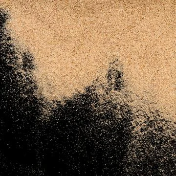 The sand on the black background Stock Photos