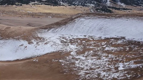 Sand blowing across the dunes in Great Sand Dunes National Park Stock Footage 125201311