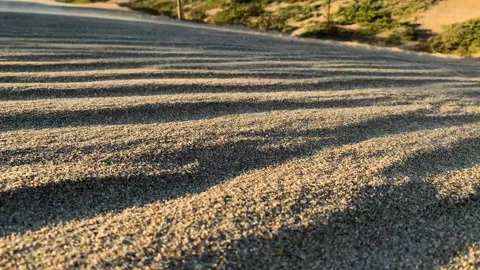 Sand blows in the wind on rolling sand dunes. California landscape, sand storm Stock Footage 234588877