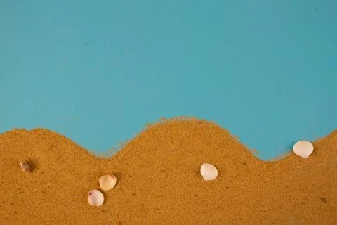 Sand on blue background Stock Photos