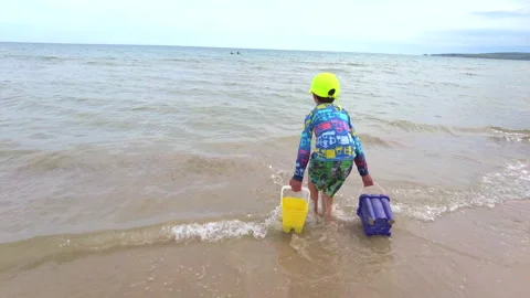 Sand Buckets in the water 스톡 동영상 229894165