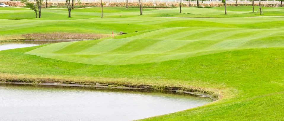 Sand bunker in golf course Stock Photos