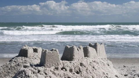 Sand castle on the ocean shore Video stock 121376313