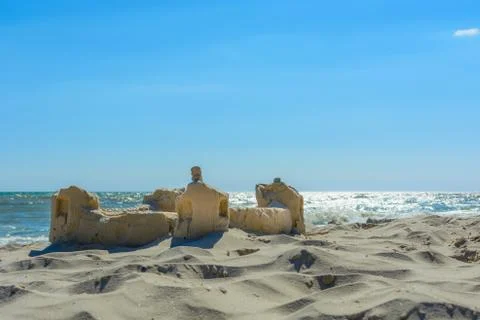 The sand castle on the seafront Stock Photos
