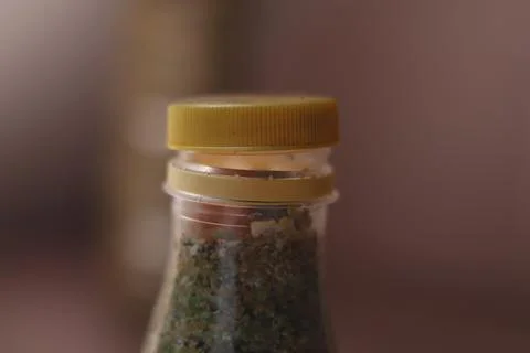 Sand in a clear bottle Foto stock