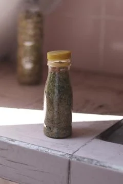 Sand in a clear bottle Stock Photos