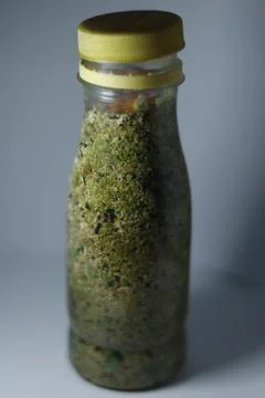 Sand in a clear bottle Stock Photos