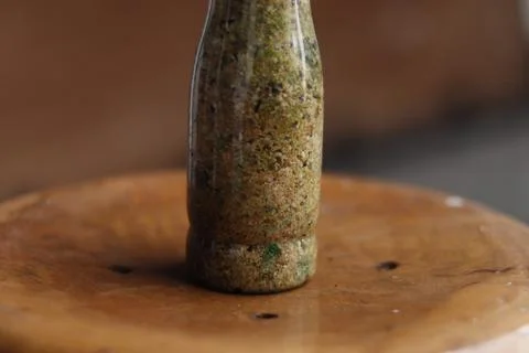 Sand in a clear bottle Stock Photos