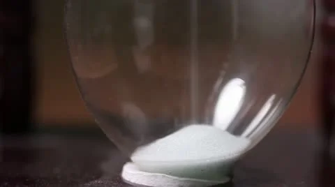 Sand clock Hourglass running close-up Stock Footage 18188512