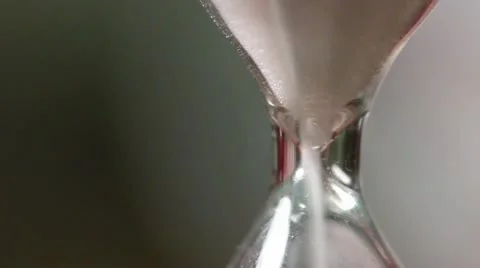 Sand clock Hourglass running close-up Stock Footage 18188522
