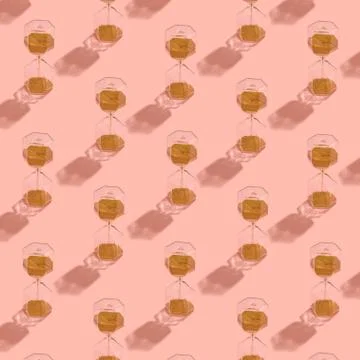 Sand clock pattern on pink background Stock Photos