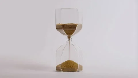 Sand clock on a white background Stock Footage 162561362
