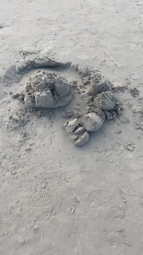 Sand construction. Sand sculpting. Vertical video  Stock Footage 287335718