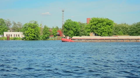 Sand container transported on a river Video stock 275389321