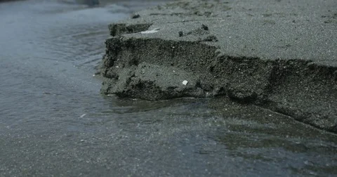 Sand Crumbling Into Salt Water Stock Footage 70844367