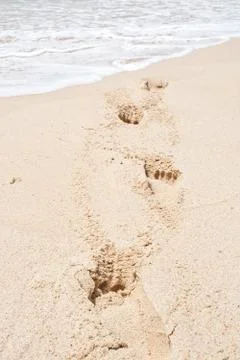 Sand with deep footprints Stock Photos