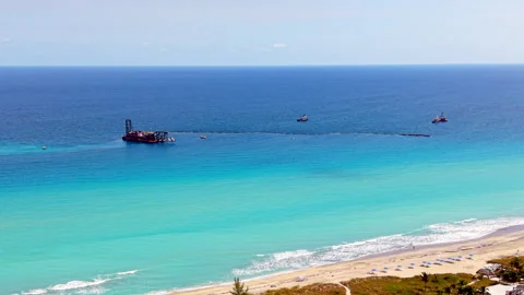 Sand dredging barge Delray Beach Florida beach restoration project 2026 Stock Footage 329447990