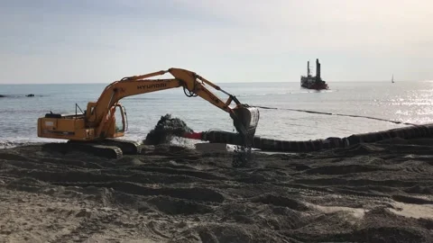 Sand Dredging from the seabed for the restoration of the beach. Video stock 165324780
