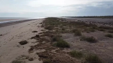 Sand dune between ocean and river, 4K" Stock Footage 212161687