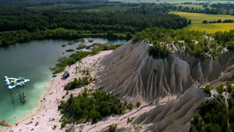 Sand dune formation. Flying over waterpark with abandoned underwater buildings Stock Footage 224524860