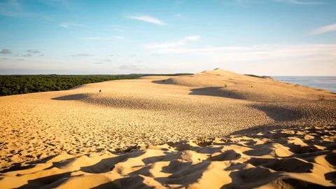 Sand dune mit moving shadows at sunset Stock Footage 95392182