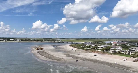 Sand dune replenishment to protect expensive beachfront homes from storm surge 動画素材 254798401